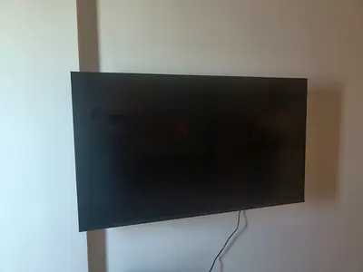 55-inch LED Smart TV - Wall-mounted, good condition