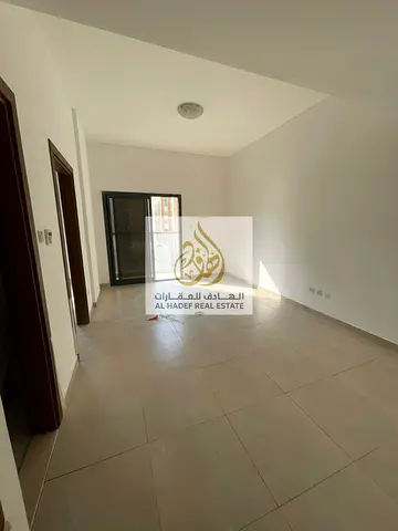 Annual rental in Ajman, Al Nuaimiya 1 area, near Al Hikma School. The building is family-oriented. The unit features one bedroom, a living room, a bal