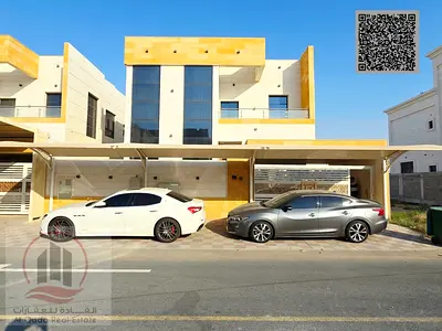 Villa for sale in Al Zahia, Ajman. Includes electricity and air conditioning. Features 5 master bedrooms, a majlis, a living area, and a maid’s room.