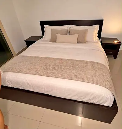 Ikea king size bed with mattress and storage drawers