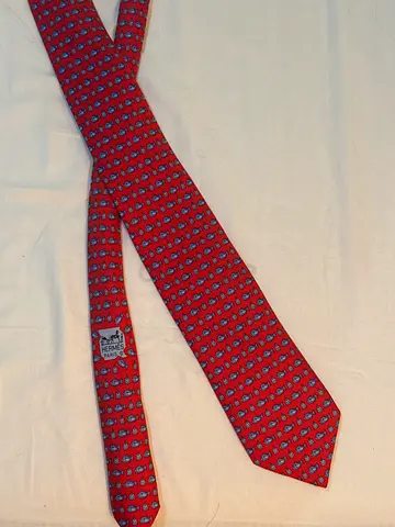 Red patterned men's silk tie - classic formal accessory hermas