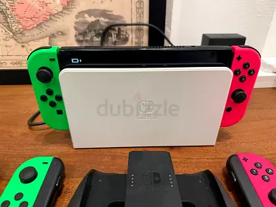 Nintendo Switch OLED with Neon Green & Pink Joy‑Cons, Dock and Accessories