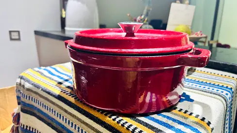 Red enameled cast iron Dutch oven / casserole with lid - good condition