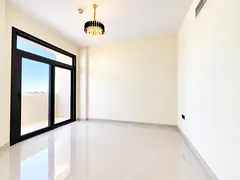 Big offer 12 Cheque Luxury 1Bedroom With balcony Aljada outside