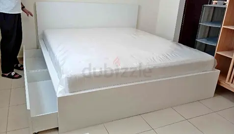IKEA malam King size bed frame with new mattress neat and clean and 2 Big storage drawers