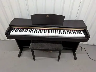 Yamaha Arius YDP160 with piano bench. Perfect working. Cash on delivery with six months warranty.