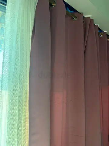 Light-blocking eyelet curtains with sheer liner