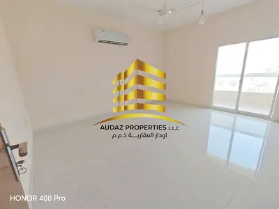 One bedroom and a living room in Ajman Corniche with a balcony and a separate kitchen