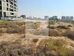 Land for a residential building with a permit for G + 3 .