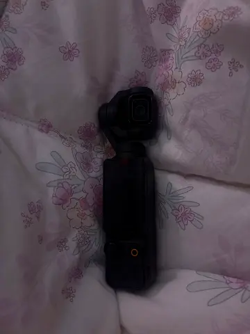 DJI Osmo Pocket handheld gimbal camera - compact and portable
