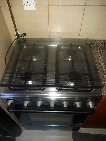 Used freestanding gas oven with 4 burners and built-in oven - good condition
