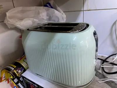 Used two-slice pastel green toaster - good working condition