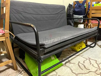 Foldable Metal Frame Sofa Bed with Grey Cushion - Good Condition