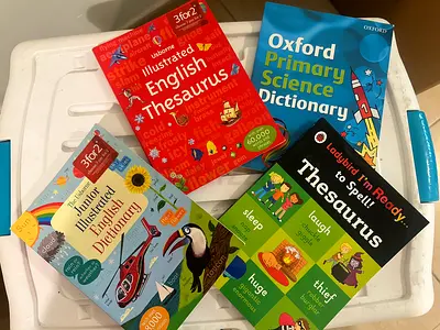 Set of 4 children's reference books: Dictionaries & Thesauruses (good condition)