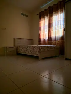 Room with attached bath for working couples/family_Near Gaelan/Oriana hospital Al Taawun