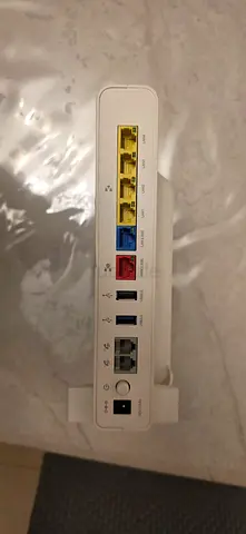 Used Wi‑Fi Router / Modem with Multiple LAN Ports - Good Working Condition. Upto 1gbps speed.
