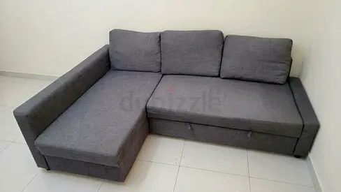 Grey L-shaped Corner Sofa with Storage - Good Condition