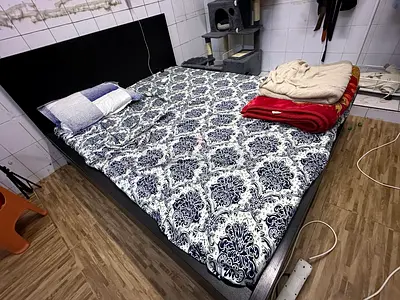 King size wooden bed with mattress and two side drawers