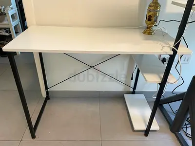 Compact white study desk with side shelves — good condition
