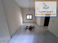 One-bedroom apartment with a living room, central air conditioning, and a spacious layout; located i
