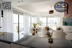 One-bedroom apartment with a living room for sale In the Glam Al Zorah project; open view