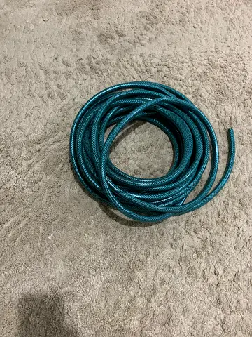 Used garden hose - braided green hose, good condition