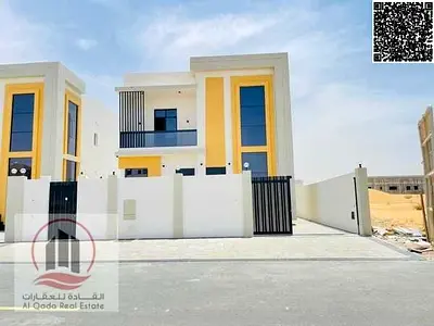 Villa for sale in Al Zahia, Ajman. Features 4 master bedrooms, a majlis, a living area, and a maid’s room. Available for freehold ownership