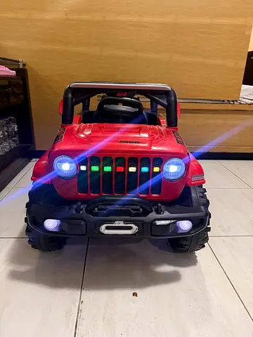 Red Kids Ride-On Electric Jeep with Lights - Good Working Condition