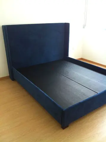 Dark blue upholstered Queen bed frame with headboard