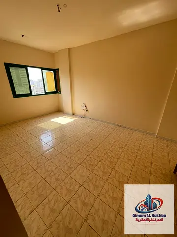 1BR in Al Nabba near Midan Al Sa'a Restaurant, AED 26K, central AC and gas, parking, 1 month free, family-only, 4 or 6 payments.
