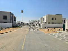 Residential/investment land for sale in the Al Zahia area, Emirate of Ajman, with a permit for the c