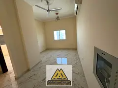 2 bedrooms and a living room | 2 bathrooms | Split air conditioning | Prime location near Ajman Acad