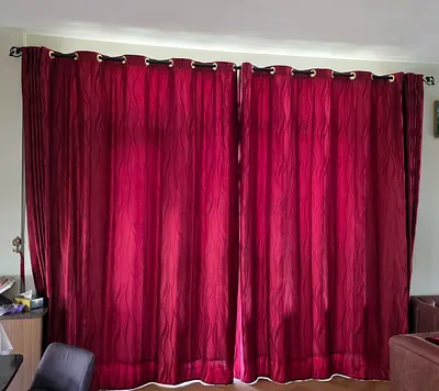 Black out Maroon eyelet curtains with subtle wave pattern - set of 2 panels. 285cm length × 300cm
