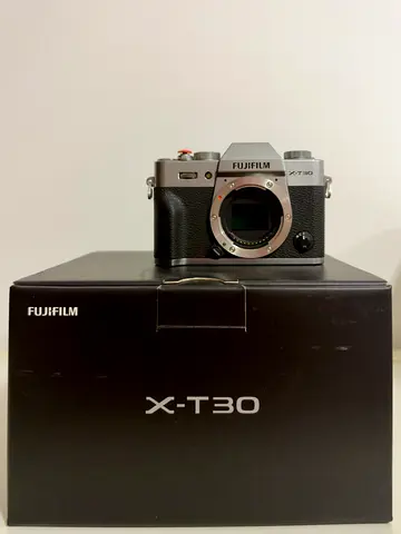 Fujifilm X-T30 mirrorless camera body (silver) with original box and three lenses with the packaging