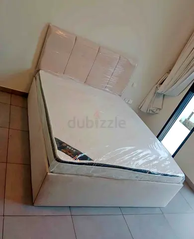 BRAND NEW DOUBLE SIZE FABRIC BED WITH MATTRESS AVAILABLE