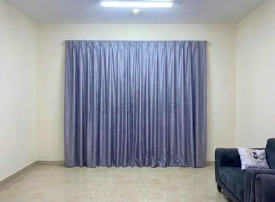 Full-length grey fabric curtains — good condition, ready to hang