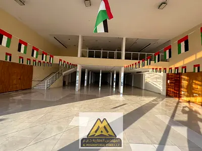 شووروم تجاري ضخم للإيجار السنوي في الجرف الصناعية 1 عجمان | مقابل السوق الصيني مباشرة | مساحة 11,081 قدم مربع (أرضي + ميزانين) | 600,000 درهم (4 دفعات