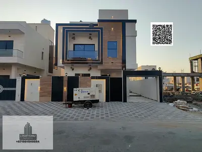 Villa for sale in Ajman, Al Helio area. 4 master bedrooms, majlis, living room, and maid's room. Ba