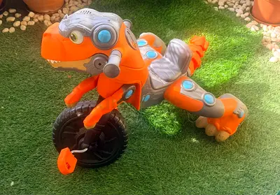 Kids Orange Dinosaur Ride-On Tricycle — Good Condition
