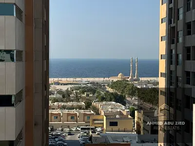شقة غرفة وصالة بإطلالة بحرية جزئية في أبراج عجمان وان الراشدية 3 | غرفة ماستر وغرفة غسيل وبلكونة وجيم ومسبح | 36 ألف 4 دفعات سهل الوصول لدبي والشارقه