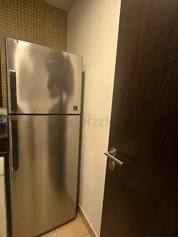 Whirlpool stainless steel double-door refrigerator - good working condition