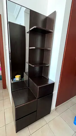 Dark wood dressing unit with mirror and open shelves, one drawer and two closed compartments