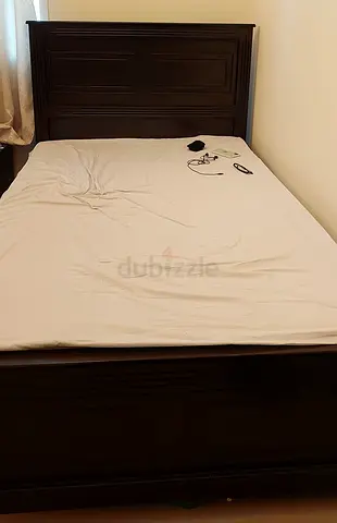 Queen Size bed wooden brown color