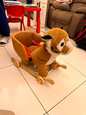 Plush Tiger Ride-on Rocker with Wheels and Safety Strap - Good Condition