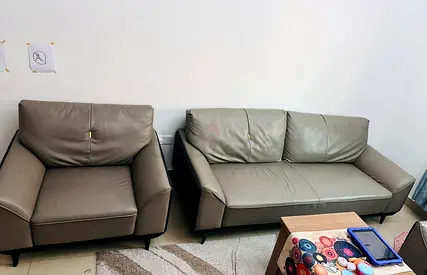 Grey leather 5 seater sofa + matching armchair set — very good condition