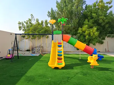Kids outdoor playset with slide, swings and tunnel — good condition