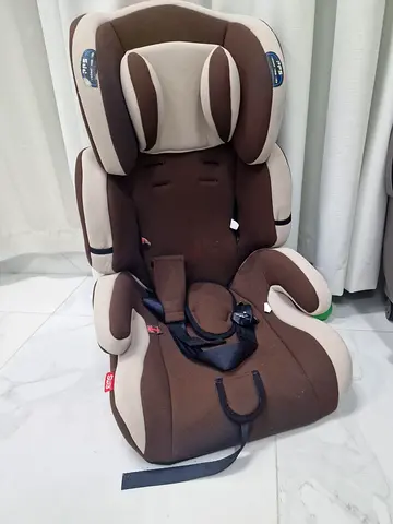 Brown and beige convertible toddler car seat - good used condition