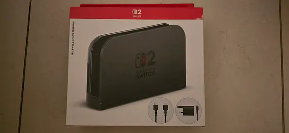 Nintendo Switch 2 dock with power adaptor and hdmi cable in perfect condition