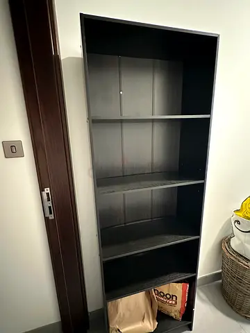 Tall dark wood bookcase / shelving unit - good condition
