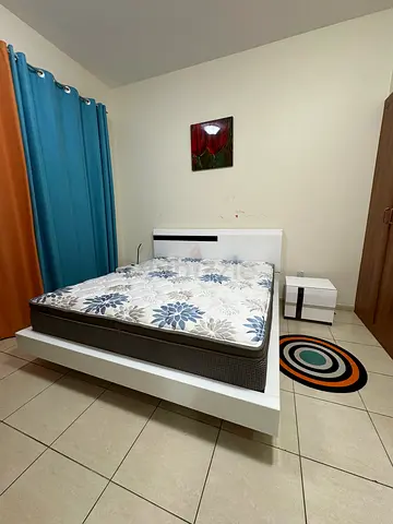 Solace King Bed, White modern platform with 12-inch Royal rest Sphinx mattress and 2 bedside tables